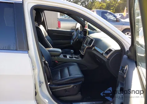 2014 Jeep Grand Cherokee Overland z USA, uszkodzony, nr VIN 1C4RJECG9EC331417